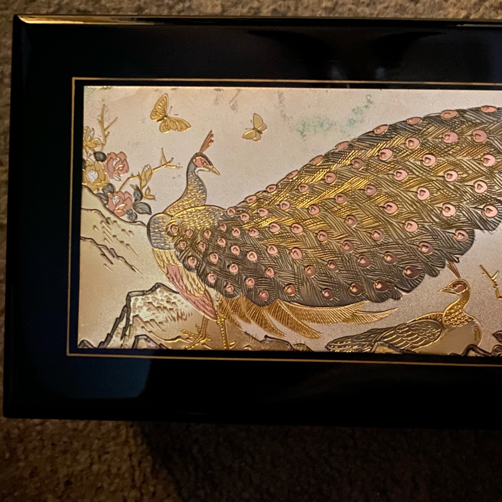 Musical jewelry box from Japan.  Plays yesterday